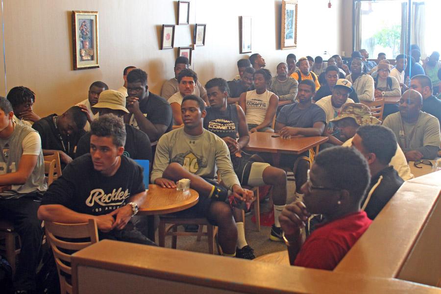 Students listen to speakers during the African-American Staff Association event in the Three Seasons Restaurant on Sept. 3.