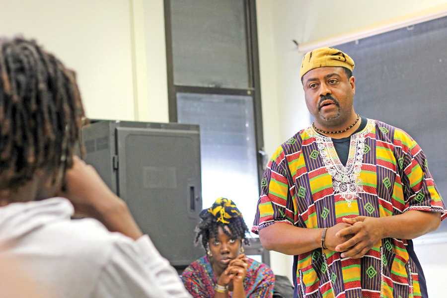 Black Student Union adviser and history professor Manu Ampim talks to students during the first BSU meeting this semester in LA-202 on Thursday.