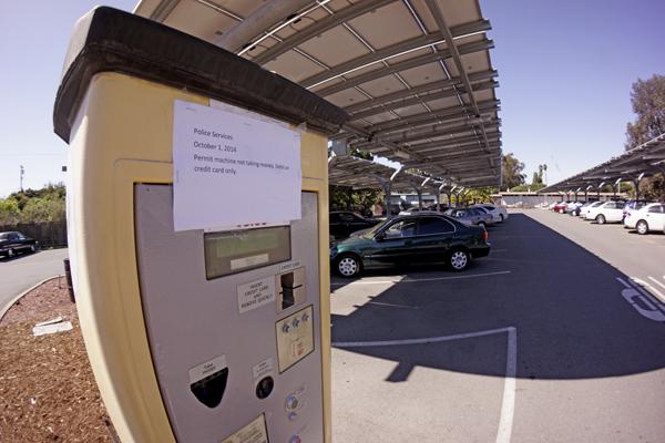 A temporary parking permit dispenser in Lot 10 has been unable to accept cash. Since Oct. 1, only credit or debit cards have been accepted. 