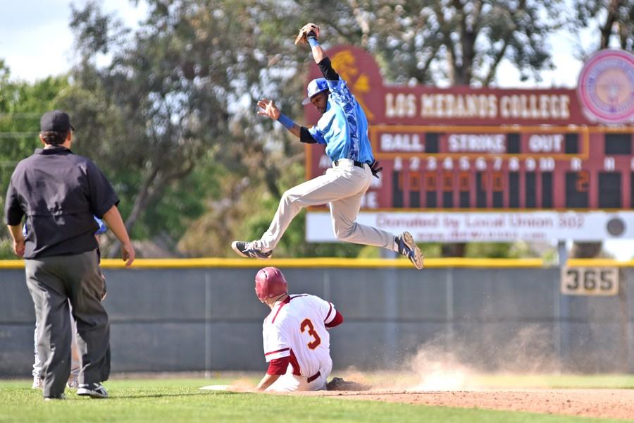 Comet second baseman Rome Watson jumps up for a catch during CCC’s 10-2 loss to the Mustangs at Los Medanos College on April 24. The Comets ended their season 6-29 overall.