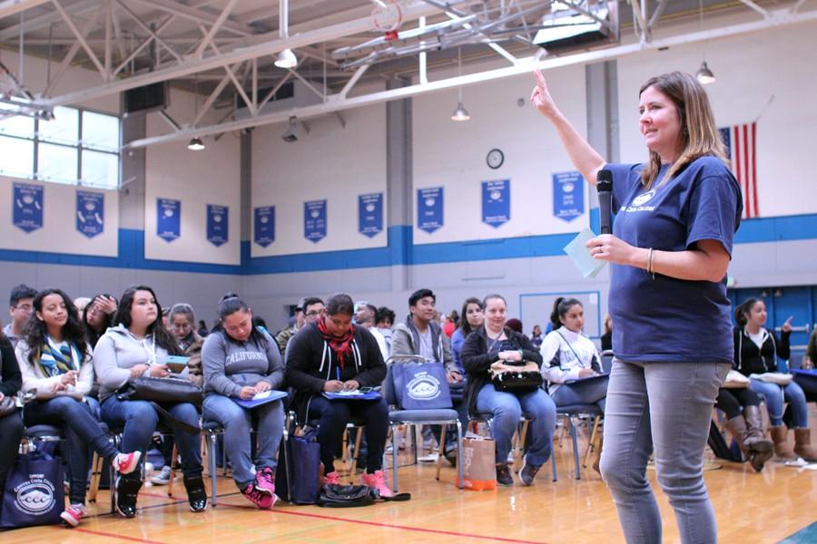 Counselor Sarah Boland explains the steps needed to enroll at Contra Costa College to incoming freshmen from surrounding high schools during the Super Saturday event in the Gymnasium on Saturday. 