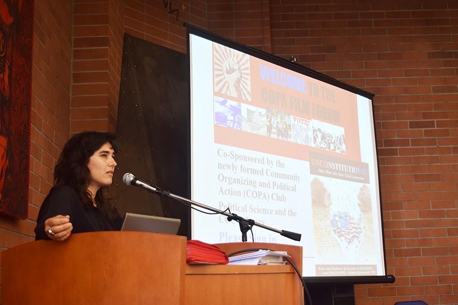 Political science 
professor Vanna Gonzales introduces the “Unconstitutional”
documentary during the Community Organizing and Political Action Club (COPA) film forum in the Library on Thursday.