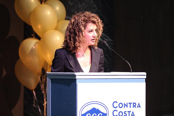 Interim President Mojdeh Mehdizadeh address faculty and classified staff members during All College Day in the Knox Center on Aug. 14.