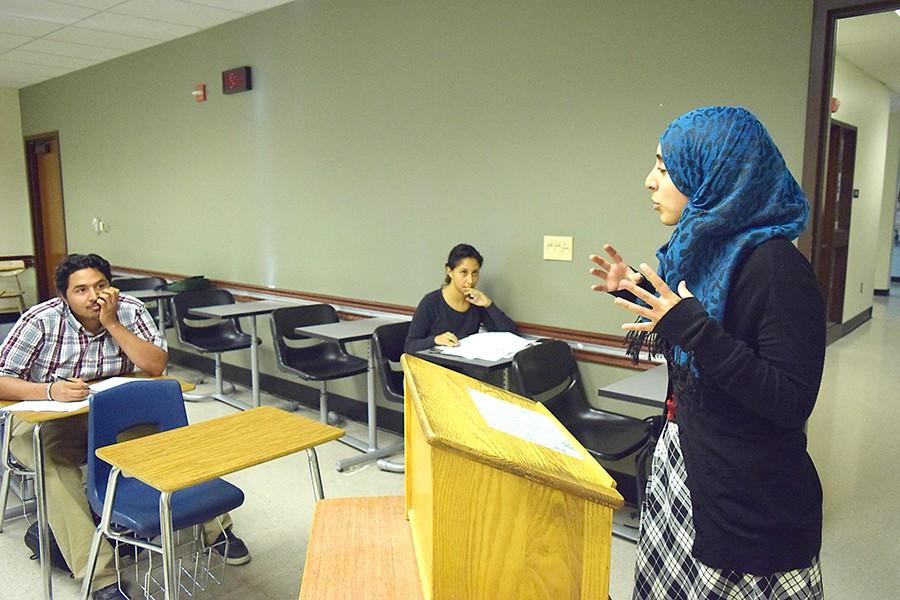 Speech and debate team member Nora Alkrizy rehearses a speech during a practice session in AA-113 on Sept. 16. The speech department will soon expand to communication studies.