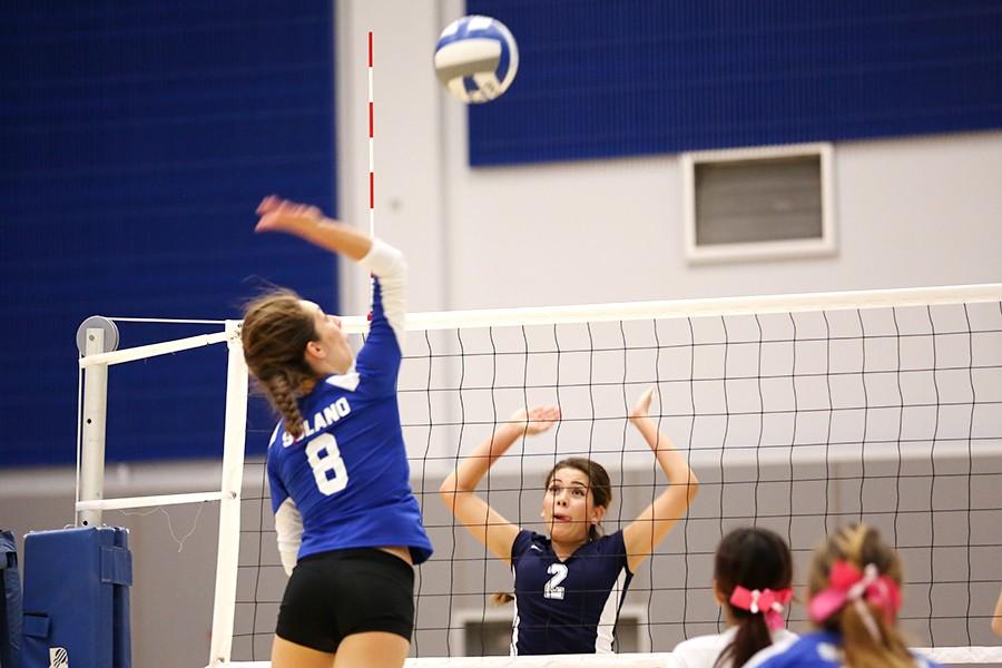 Falcon outside hitter Claudia Diaz strikes the ball to Comet setter Paula Sanchez during Contra Costa College’s three-set loss at Solano Community College on Friday.