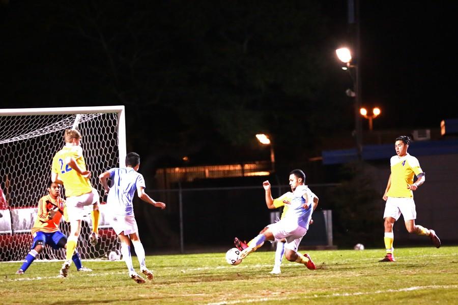 Comet forward
Alan Morales (right) fires a shot toward the near post sending the ball into the back of the net for a goal during Contra Costa College’s 3-1 win against Merritt College on Friday.