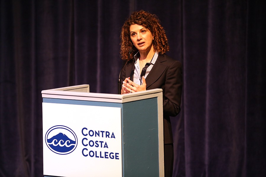 President Mojdeh Mehdizadeh speaks to members of audience, answering questions about her platform during the presidential forum on March 3 in the Knox Center.