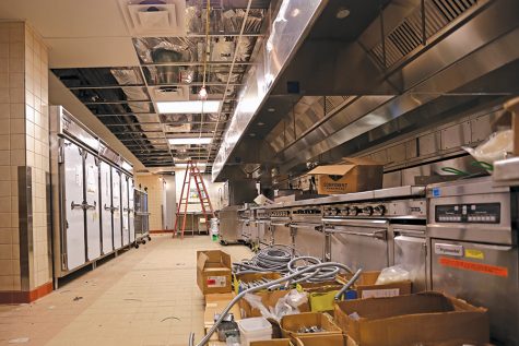 Stainless steel stoves and ovens wait to be used by culinary students in the Student and Admin-
istration Building on May 11. The new buildings will open in August.