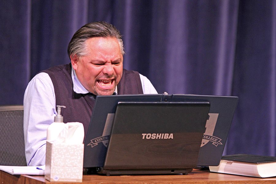  Drama department Chairperson Carlos-Manuel
Chavarria plays Richard, an adulterer with a quick temper who sends angry emails during the production of “You’ve Got Hate Mail” in the Knox Center on May 6.