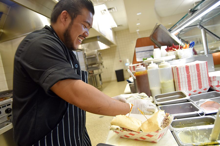 Brix cook Christopher Cabizo prepares a Philly cheesesteak sandwich from the Brix menu on Monday in the Student Dinning Hall. Brix is open from 7 a.m. to 7 p.m. Monday to Thursday and from 7 a.m. to 2 p.m. on Fridays. 