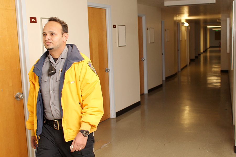 Police aide Jagrwop Singh makes his rounds in the basement of the LA Building on Monday.
The building is empty but remains open to provide elevator access to students with disabilities.
