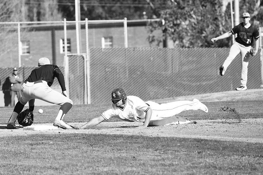 Comet infielder Elijah Smith stretches out in a head-first slide, beating the throw back to first base during CCC's 21-6 loss to Diablo Valley College at the Baseball Field on Jan. 28. The Comets' next home game is scheduled for Feb. 9 at 2 p.m. at the Baseball Field.  