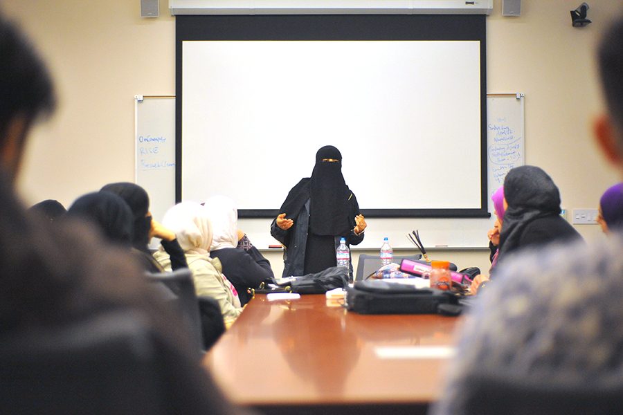 cody casares / The Advocate
Muslim Student Association President Rayah Khaled designates tasks to members during their club meeting in the Student Administration Building on March 22. Khaled’s approach for the club is to be active on campus. 