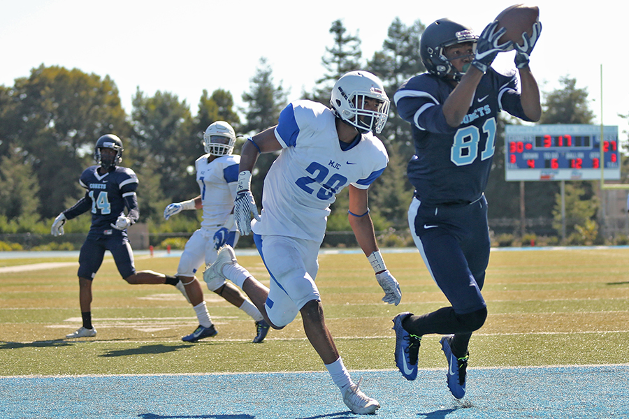 Comet wide receiver Marquis Pippins catches the ball for a touchdown during CCCs 42-34 win against Modesto Junior College at Comet Stadium on Sept. 28.