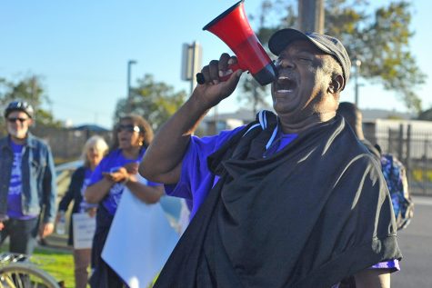 Pastors Darnell Jones chants during the Citywide Walk event hosted by the Richmond Ceasefire in Richmond, Calif. on July 21. 