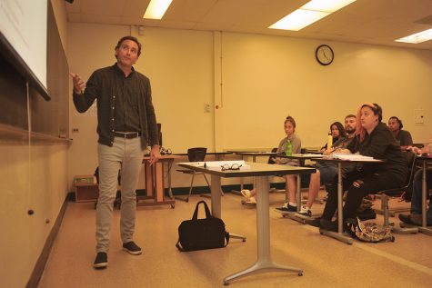 Philosophy professor Michael Kilivris lectures during a class in the Biological Sciences Building Room 8 on Aug. 14.