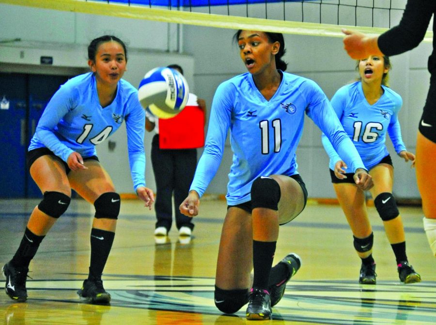 Comet middle hitter Makaya Thomas (middle) reacts to the balls rebound with Comet outside hitter Victoria Matue (left) and defensive specialist Jacqueline Tianero (right) after hitting a ball into the net during Contra Costa College’s 3-0 loss to Solano Community College on Friday.