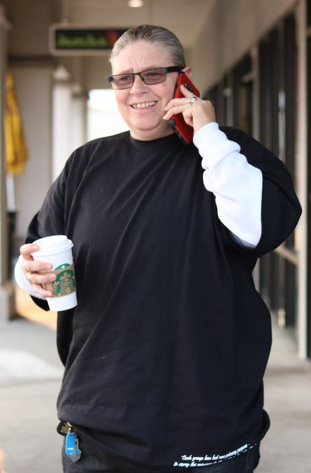 Grabbing a coffee in San Pablo, Fairchild makes herself available on the phone for last minute schedule changes on Tuesday morning.