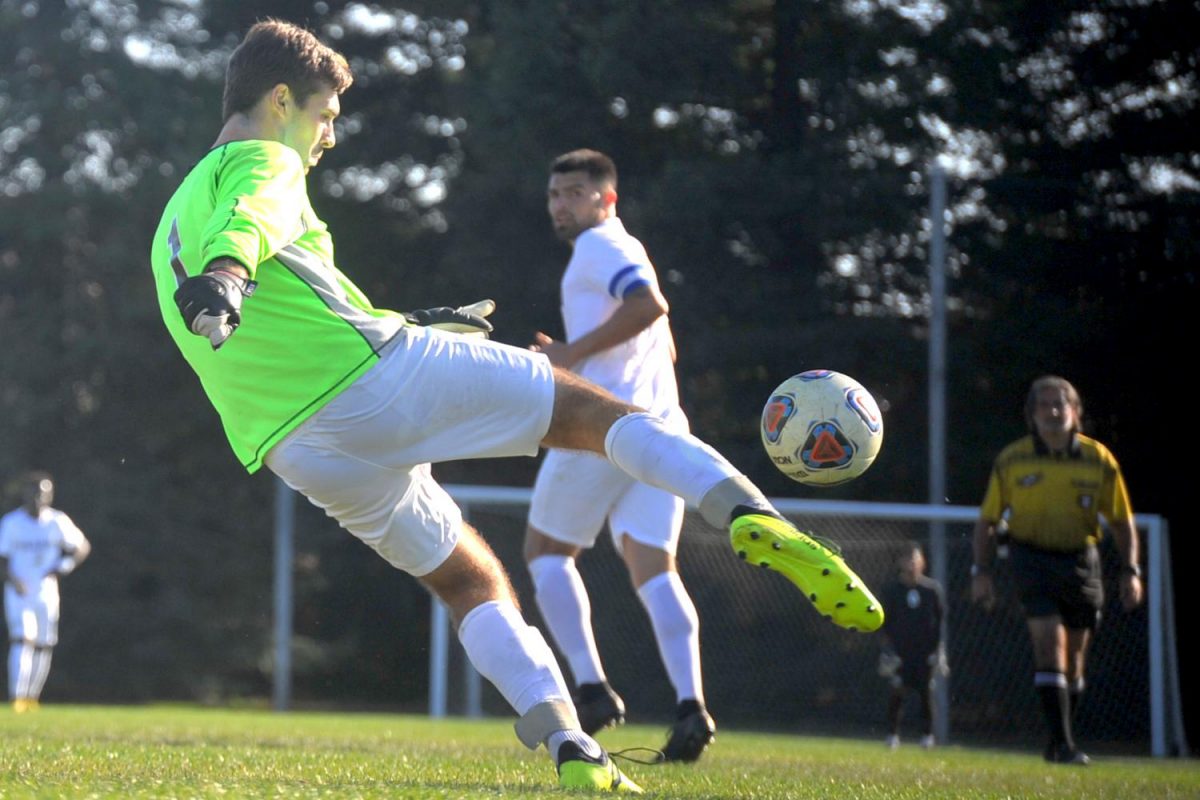 Mariner goalkeeper Colin Sneddon clears the ball from his goal area. Sneddon was scored on 5 times during Contra Costa Colleges 5-1 win against College of Marin in the Soccer Field on Tuesday. 