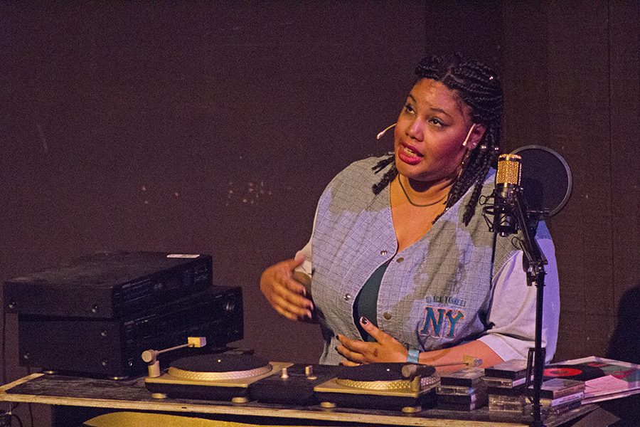 Selector, played by Akilah Kamau, narrates the action in the hip-hop inspired play “How We Got On” in the Knox Center on Thursday. The play continues this weekend.
