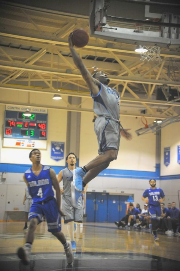 Guard Kemare Wright dunks during Contra Costa College’s 92-63 victory against Solano Community College on Jan. 31 in the Gym.