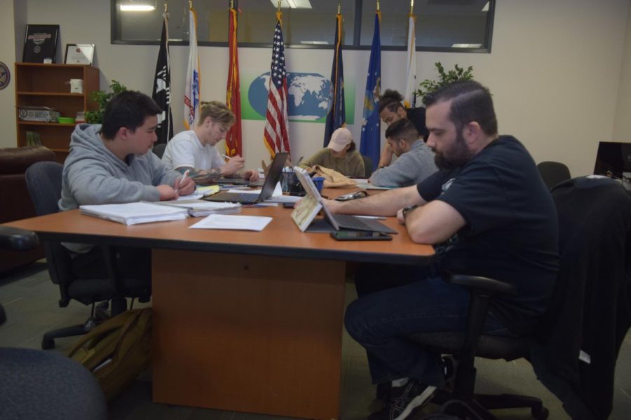 Chris Babcock, a mechanical engineering major (right) and John Mortera, an electrical engineering major (left) study on their laptops in the Veterans’ Resource Center.