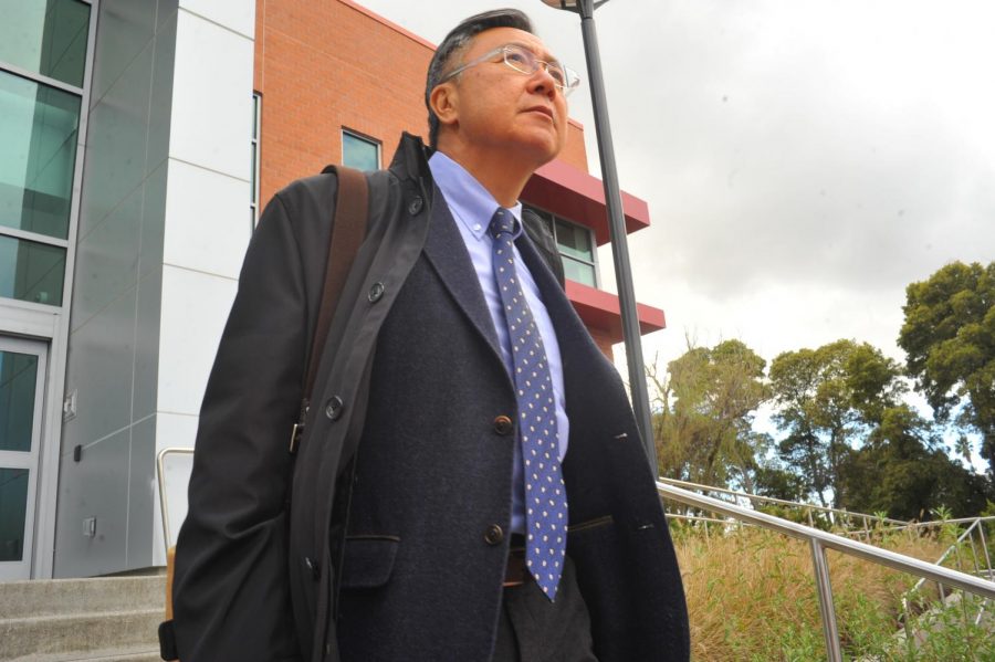Contra Costa College Interim President Chui L. Tsang walks to his car after his first day at CCC in San Pablo, California on March 16.
Tsang, a CCC alum, suspended his retirement to fill the position until a permanent president is selected by July.