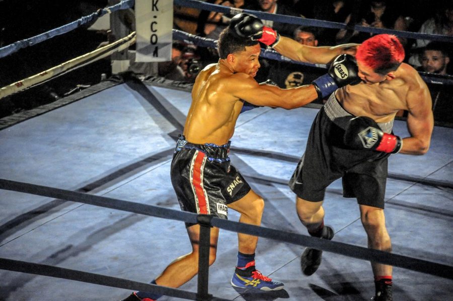 Karim “The Hard Hitta” Mayfield 
(left) jabs 
Gaku Takahashi 
(right) during   Mayfield’s unanimous decision in the main event of the  “Battle in the Ballroom” event in the Fairmont Hotel Ballroom in San Francisco,  California on April 5. 