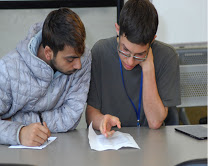 English major Ellis Ryan Mille tutors a student in the Library Learning and Resource Center.