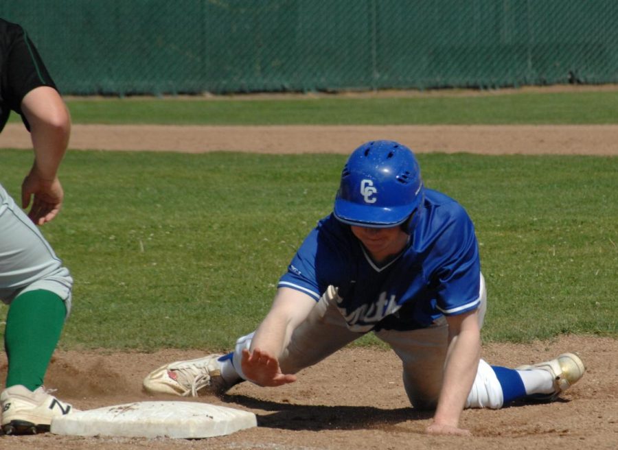 Comet right fielder Dylan Wilson dives back to first base to beat the throw following a shallow pop fly in the
second inning of CCC’s season-ending victory against Napa Valley College Friday at the Baseball Field.