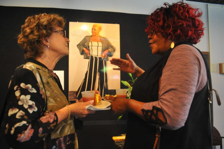Barbara Grillo (left) and Richmond resident Wendy Mouton (right) talk about Intisar Shareef after her memorial service at the Knox Center.