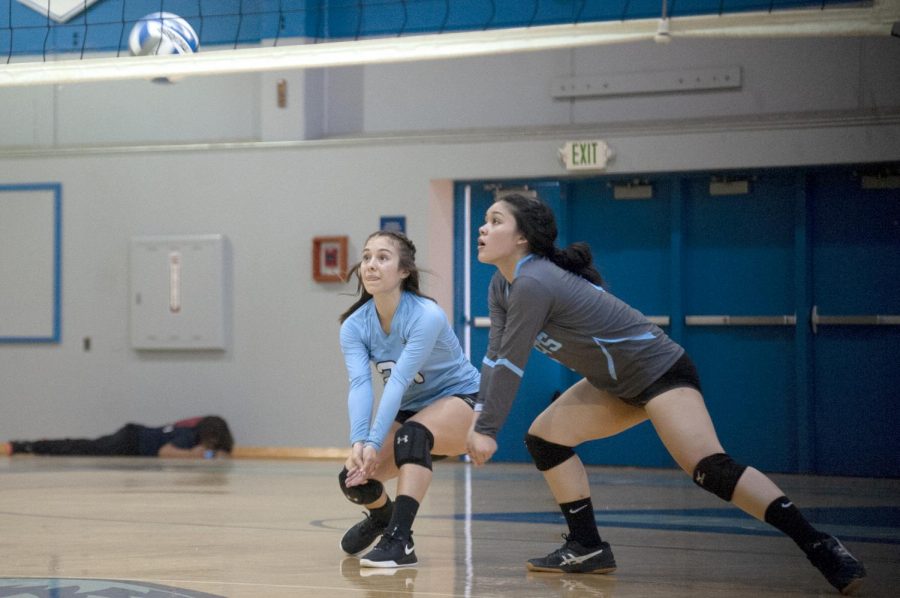 Libero Delanie Baca (left) and outside hitter Chrischelle Reyes (right) anticipate a ball during Contra Costa College’s 3-0 defeat against College of Marin on Friday at the Gym. 