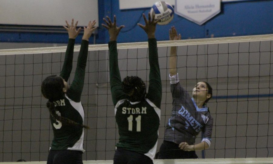 Right setter Rosa Olivar attempts to score over Napa Valley College middle blocker Alexia Stewart in Contra Costa College’s 3-0 victory in the Gymnasium on Friday.