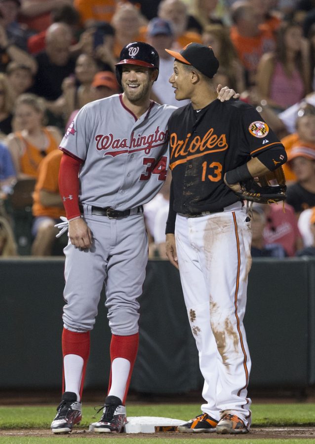 Free agents Bryce Harper and Manny Machado remain free agents as spring training is set to begin.