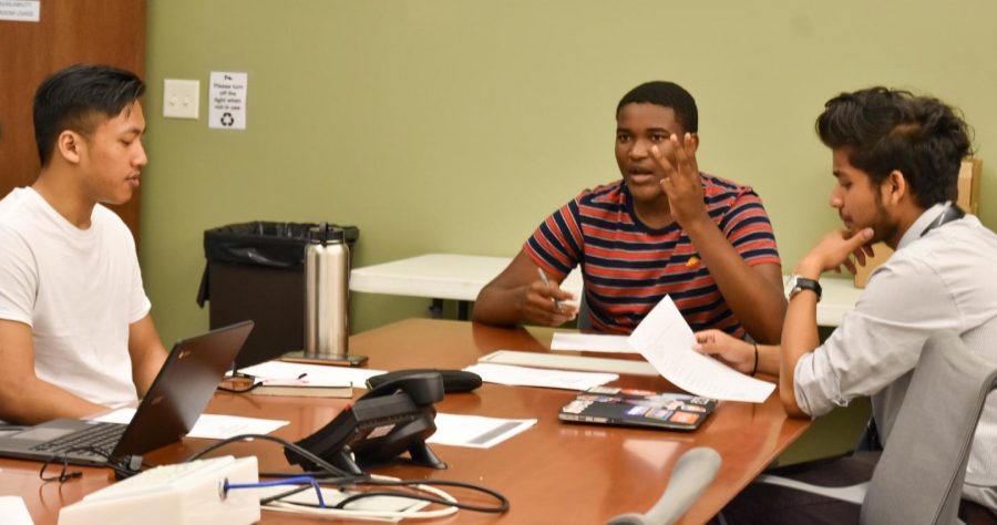 Chris Siriyam (left), Associated Student Union President Preston Akubuo-Onwuemeka (middle) and Shreejal Luitel (right) meet in the Associated Students Union office in SA-109.