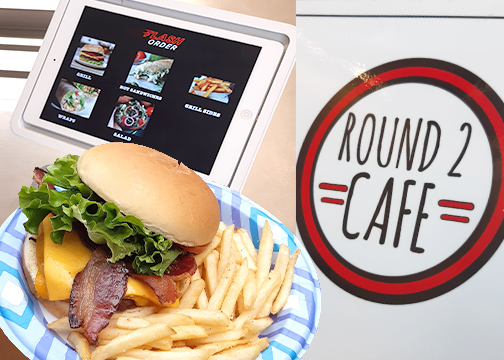 New touchscreen tablets are installed at the counter to make ordering food faster and more efficient. A bacon cheeseburger and classic fries are shown above.