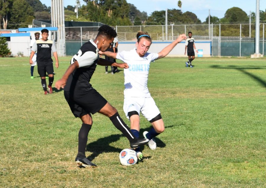 Comet player Nick Silva (right) fights for the ball duringa  6-0 blow out home loss to San Joaquin Delta College, the first of a five-game losing streak to start the 2019 season.