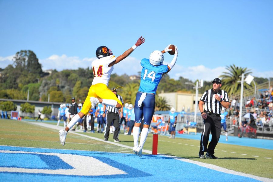 Comet wide reciever Dominique Latham catches a pass for a first quarter touchdown during Contra Cota Colleges 35-33 win against College of the Redwoods at Comet Stadium in San Pablo, California on  on Sept. 5.