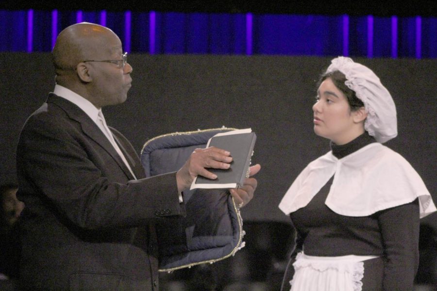 Elizabeth Donderstock (right), played by Jelaine Maestas, speaks with Rev. Tollhouse (left), played by Elijah Sterling, during a rehearsal of “The Book of Liz,” which concluded its run in the Knox Center this past weekend.