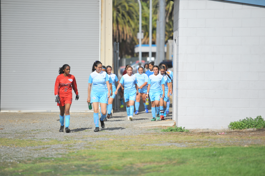 The women’s soccer team (3-10) walks to the Soccer Field for a home game on Aug. 27 during their first full season in over two years.