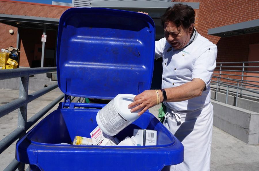 Culinary department Chairperson Nader Sharkes places plastic waste in the recyclable container adding to his department’s focus on decreasing the carbon footprint of the campus.