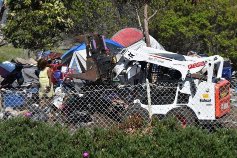 A homeless encampment is being clear on March 30, in Berkeley, California, after Gov. Gavin Newsom issued a statewide shelter-in-place order.