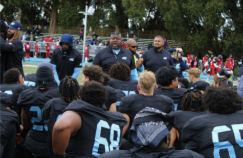 Head Coach Otis Yelverton addresses his Comets football team after a victory against Foothill College, as their team saunters to the locker room, In San Pablo, Calif., at Contra Costa College on Saturday, Oct. 23, 2021. (Photo/Joseph Porrello)

