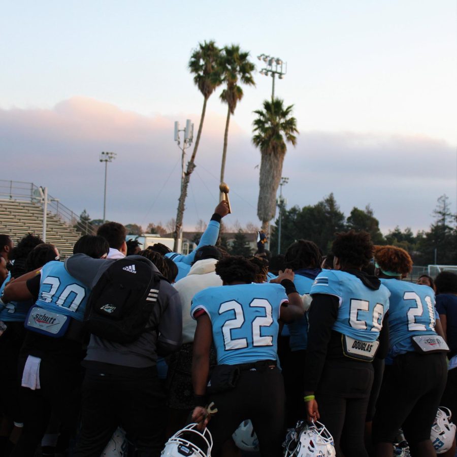 


Comets players celebrate victory by gathering around the trophy they just earned in San Pablo on Saturday Dec. 4, 2021. (Photo/Joseph Porrello)