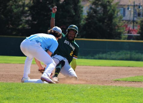 SAN PABLO, CA, March, 24- Comets third baseman Angel Carson tags out a Storm runner trying too steal third base in the second inning of Thursdays game. (Photo/Joseph Porrello)
