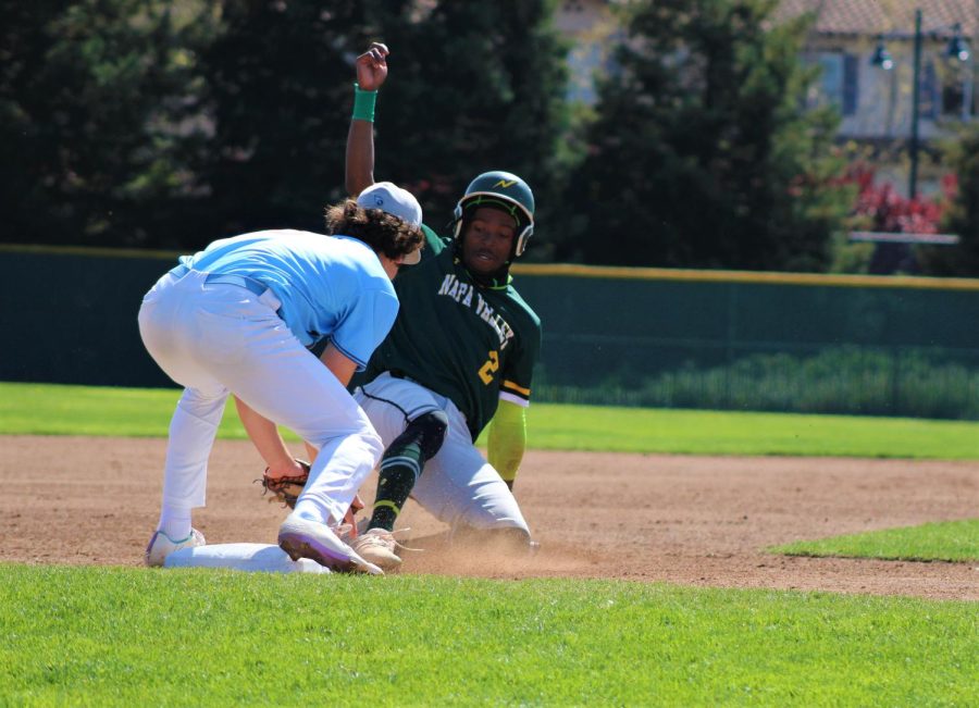 SAN+PABLO%2C+CA%2C+March%2C+24-+Comets+third+baseman+Angel+Carson+tags+out+a+Storm+runner+trying+too+steal+third+base+in+the+second+inning+of+Thursdays+game.+%28Photo%2FJoseph+Porrello%29