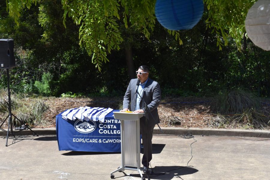 Charles Ramirez, the Interim EOPS/CARE/CALWORKs Manager, welcomes everyone to the ceremony.