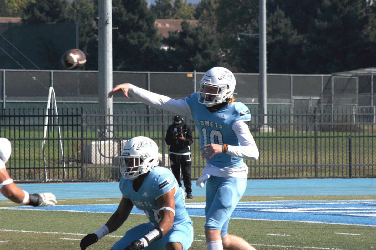 Contra Costa Comet player no#. 10, QB Zac Switzer, With his eyes close, he using the force to channel the path of the ball.

San Pablo Ca 23 September 2023, Contra Costa College vs Laney College
