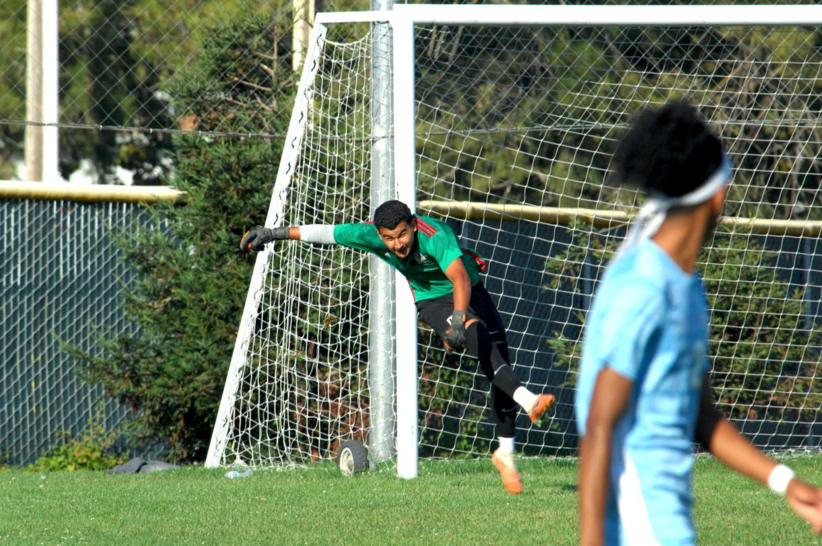 Contra Costa Comet player no#. 1, Brian Tafoya Chavez, (Goalkeeper) launches the ball, with such force, landing it  close to Delta College goal

San Pablo Ca 15 September 2023, CCC vs Delta College