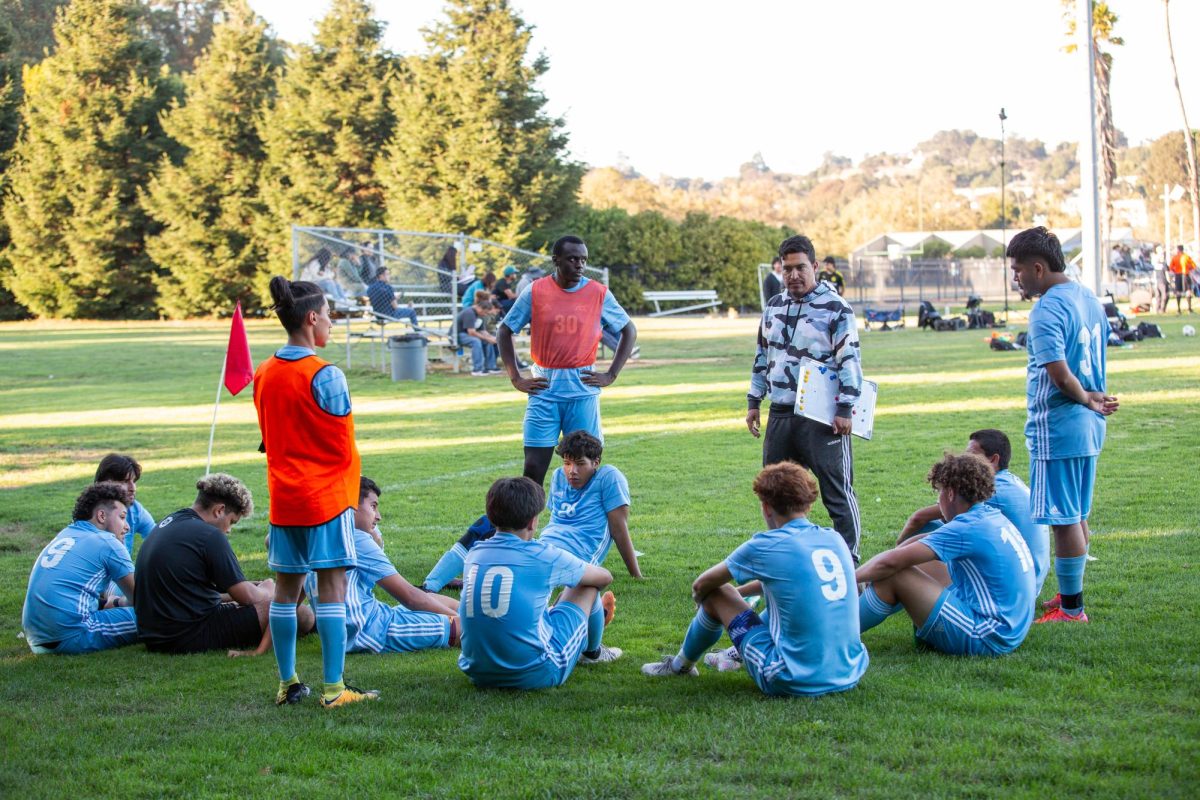 Coach Julio Ayala talking to the team during the Contra Costa College Mens Soccer Team face off against Marin College in a home game on Tuesday, Oct. 3, 2023, in San Pablo, CA.